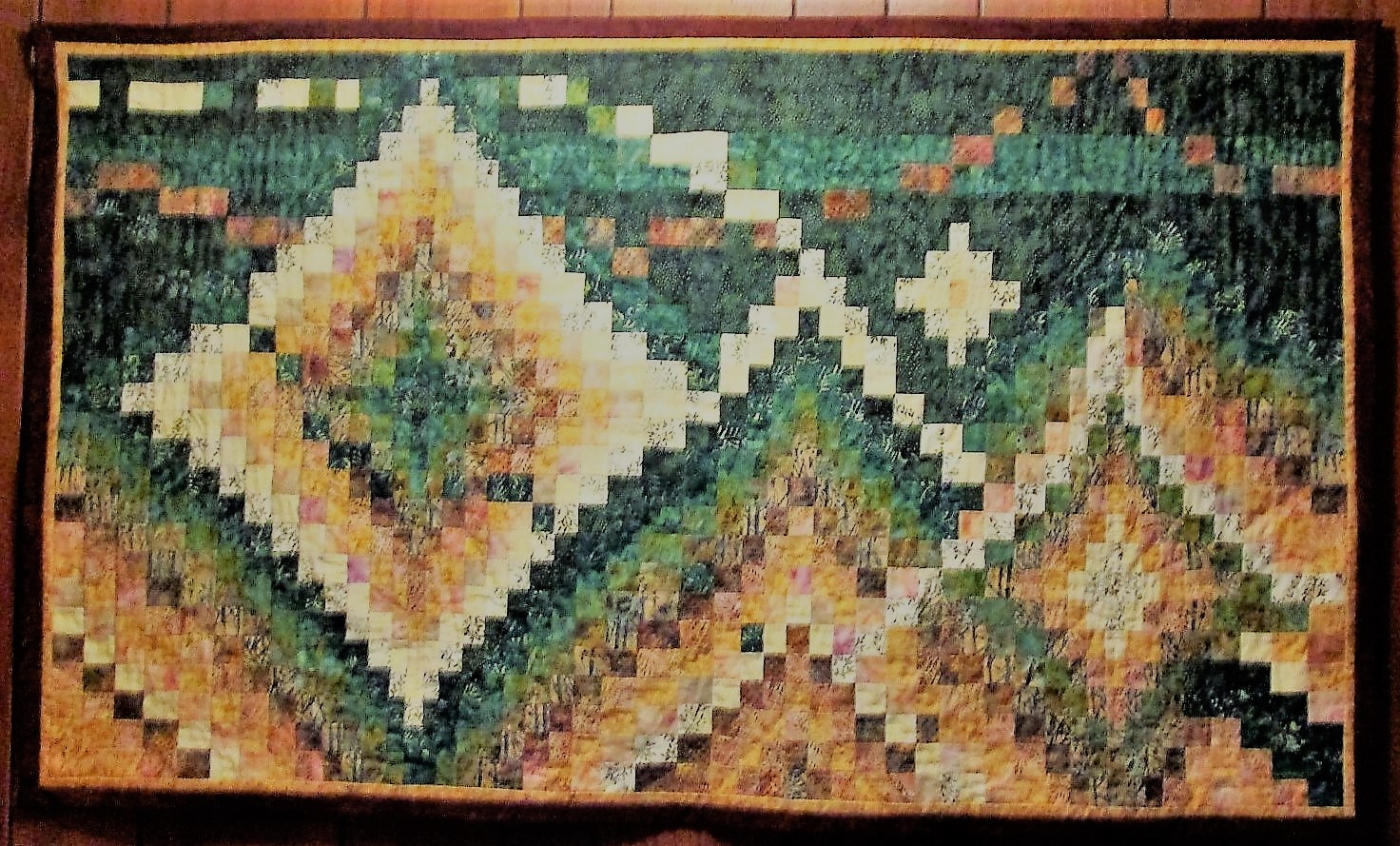 Bargello quilt in greens and tans